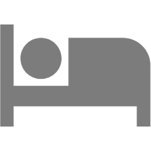 Person sleeping in bed icon